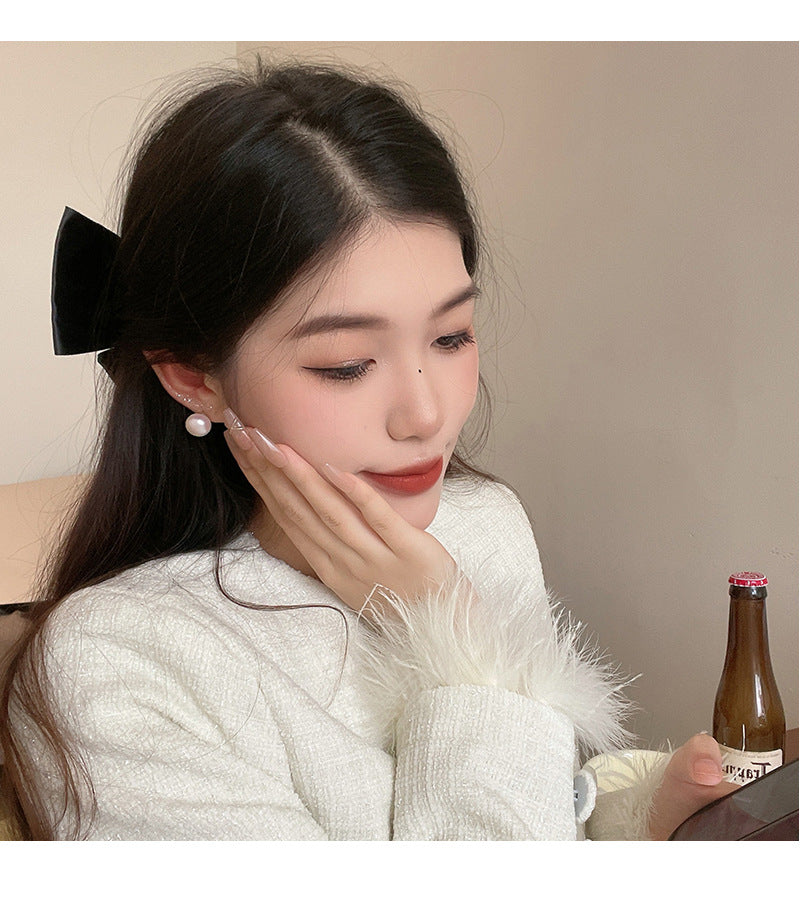 S925 silver needle steamed pearl earrings light luxury niche simple high-end earrings wholesale