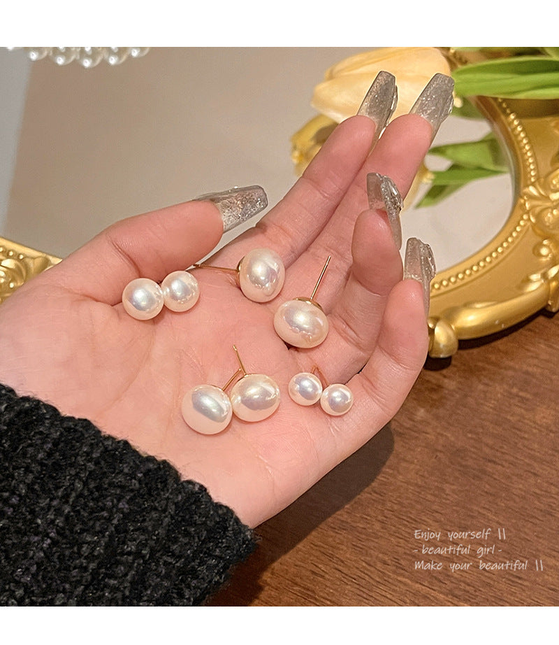 S925 silver needle steamed pearl earrings light luxury niche simple high-end earrings wholesale