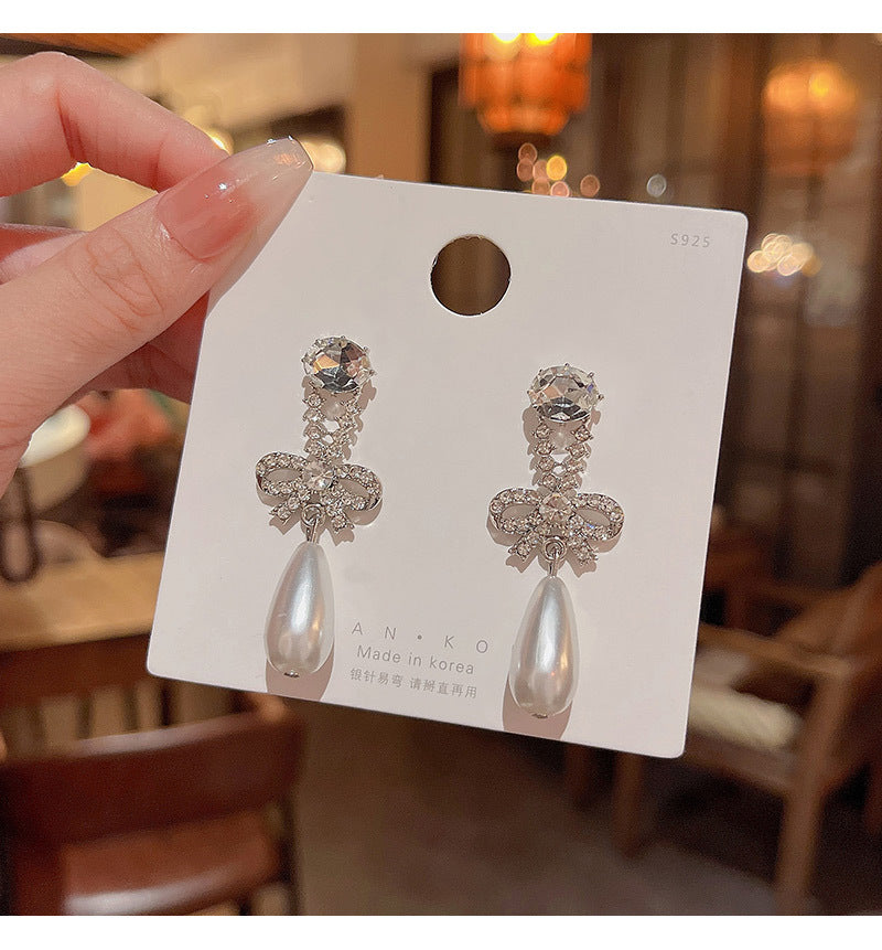 S925 silver needle light luxury niche retro temperament bow female ins diamond pearl earrings