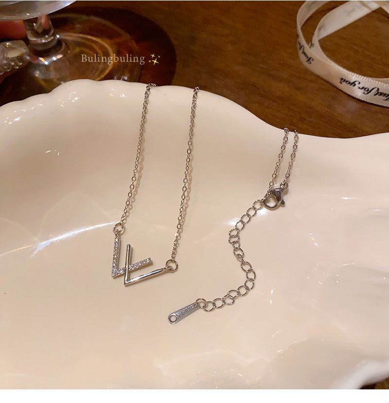 Lucky letter W titanium steel necklace light luxury niche temperament network celebrity same style
