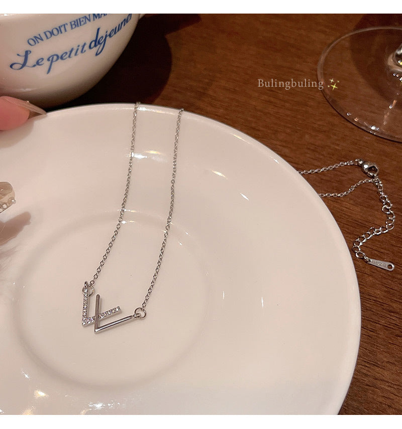 Lucky letter W titanium steel necklace light luxury niche temperament network celebrity same style