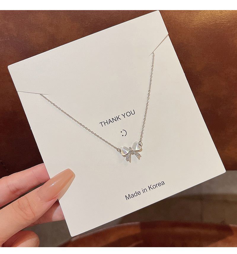 Light luxury niche cat's eye bow necklace