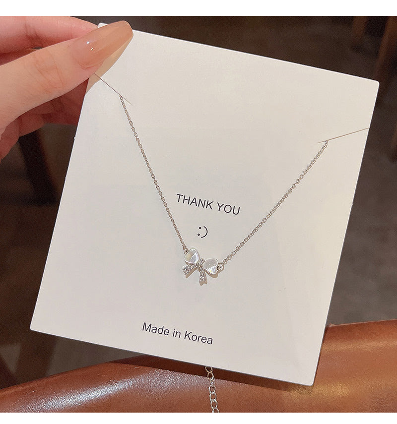 Light luxury niche cat's eye bow necklace