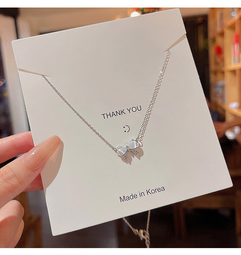 Light luxury niche cat's eye bow necklace