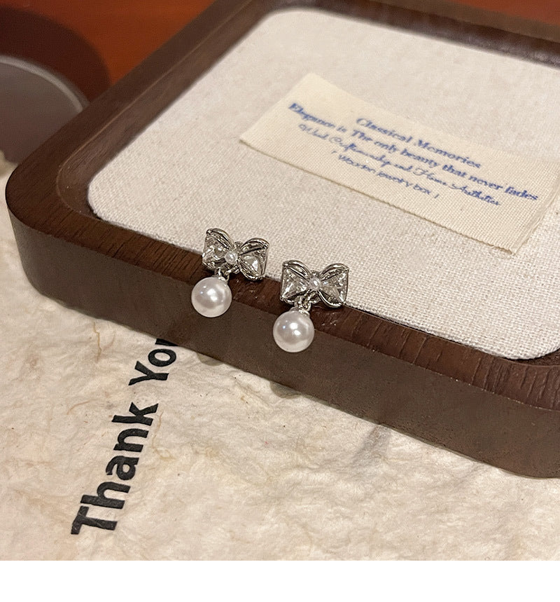 S925 silver needle light luxury simple zircon bow earrings