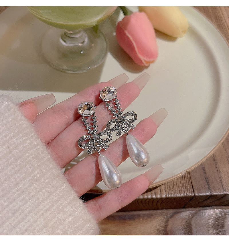 S925 silver needle light luxury niche retro temperament bow female ins diamond pearl earrings
