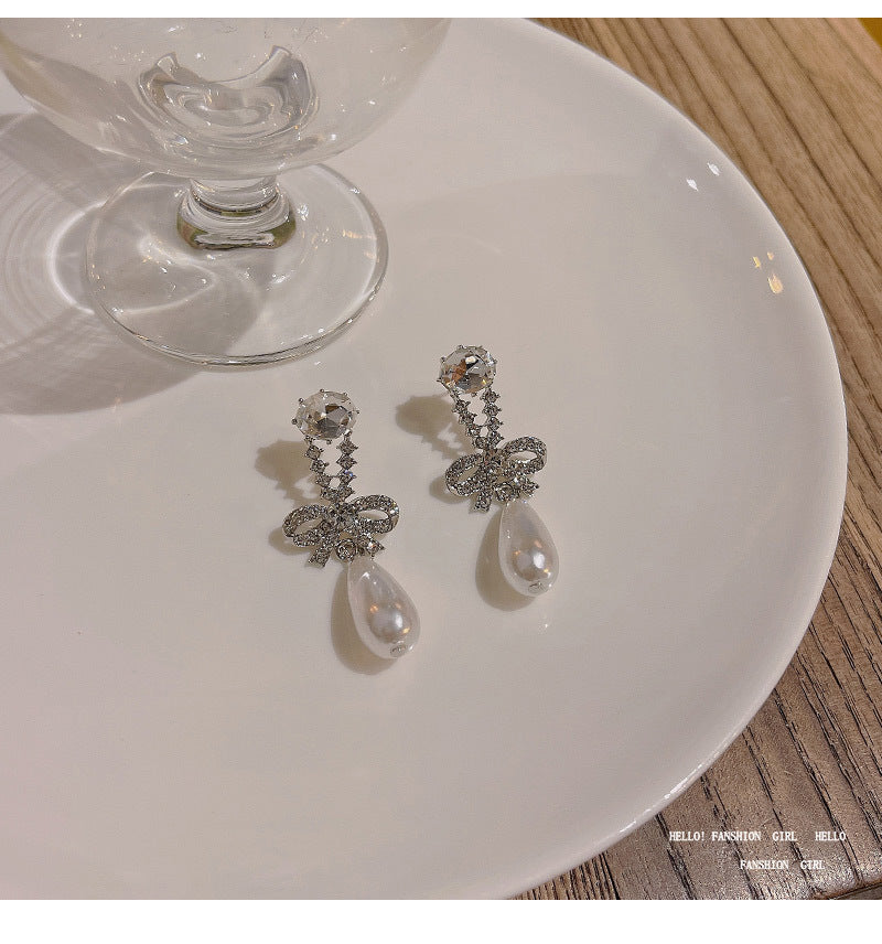 S925 silver needle light luxury niche retro temperament bow female ins diamond pearl earrings