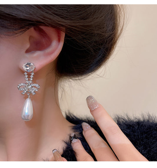 S925 silver needle light luxury niche retro temperament bow female ins diamond pearl earrings