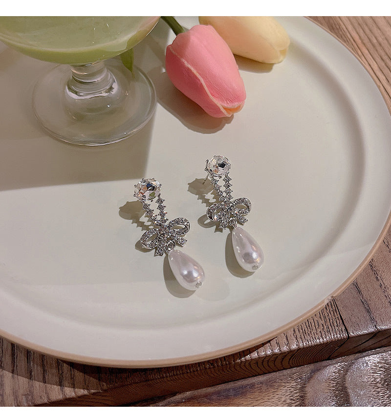 S925 silver needle light luxury niche retro temperament bow female ins diamond pearl earrings